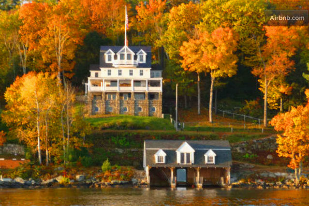 View of the boat house and house from the lake.